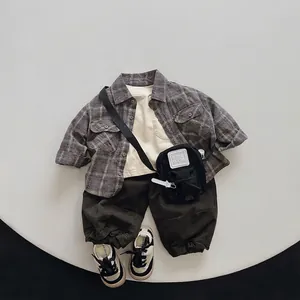 Classic boys plaid shirt with beige inner T-shirt and brown jogger pants set