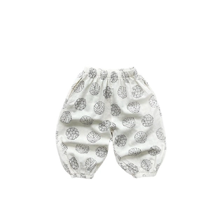 Loose cotton leaf print bloomers for kids with elastic waist and cuffs in white