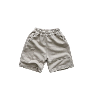 Kids loose casual knit shorts with elastic waistband and utility pocket in khaki beige