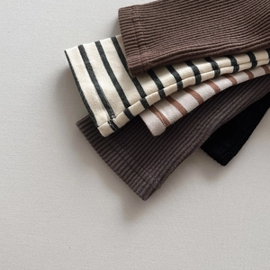 Kids ribbed cotton leggings set in five neutral colors including stripes and solids