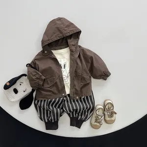 Three-piece kids autumn set with brown hooded jacket, rabbit print tee and striped pants