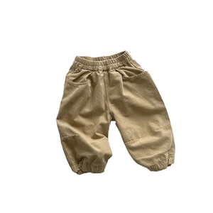Kids khaki cargo pants with elastic waist and pockets in a loose harlem style fit