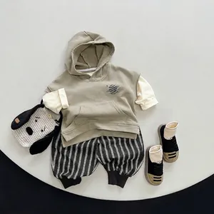 Three-piece Korean style kids outfit with planet print vest and striped joggers