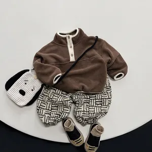 Winter fleece-lined kids brown sweatshirt and geometric print pants warm outfit set