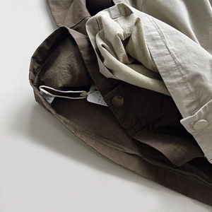 Kids minimalist patchwork jacket with snap buttons and high-quality twill fabric detail