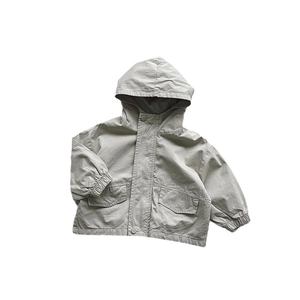 Kids minimalist hooded windbreaker jacket with large utility pockets and button closure