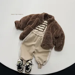 Kids winter outfit set with brown fleece jacket, striped shirt, and beige joggers
