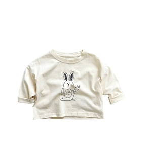 Children's long-sleeve cotton T-shirt featuring a cute cartoon bunny graphic on beige fabric