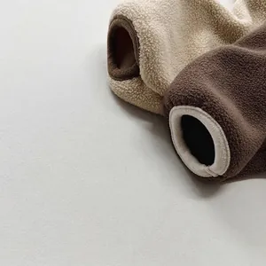 Soft fleece sweater for kids in beige and dark brown with warm winter texture and cuffs