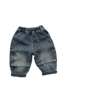 Kids vintage blue fleece lined denim pants with elastic waist and ribbed cuffs