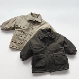 Detail of padded cotton trench coats in khaki and olive with large front utility pockets