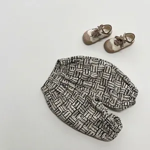 Pantalon enfant rétro en polaire avec motif géométrique et taille élastique douce