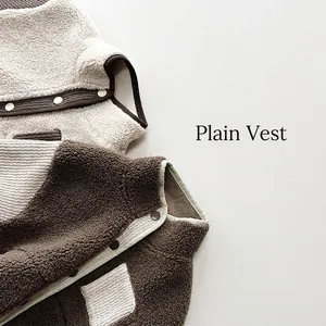 Kids warm fleece vests in beige and dark brown with contrast trim and snap buttons