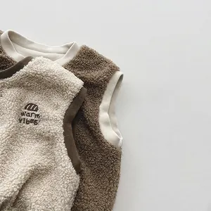 Soft fleece children's vests in beige and coffee colors with warm vibes embroidery