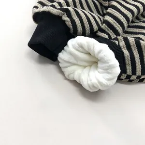 Fleece-lined striped kids top with warm faux shearling lining and ribbed cuffs