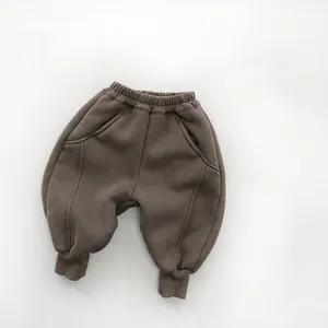 Close-up of kids warm fleece jogger with elastic waistband and deep side pockets