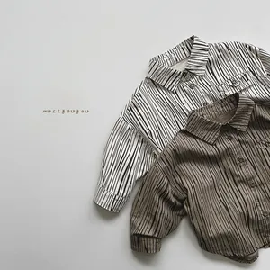 Detail of long sleeve cotton linen striped shirts with pocket and classic buttons