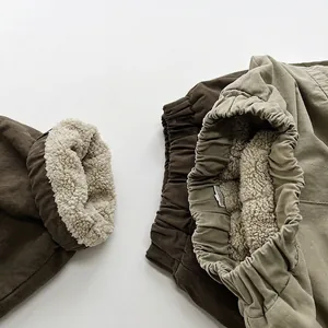 Boys winter cargo pants with thick warm fleece lining and elastic waist in solid colors