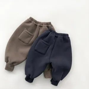 Kids warm fleece lined joggers in brown and dark blue with elastic waist and ribbed cuffs