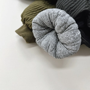 Thick warm winter padded pants for children featuring high-quality knit texture in grey and green
