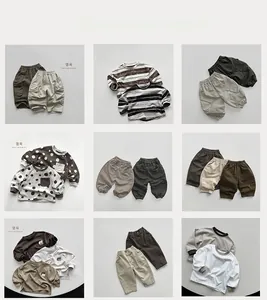 Variety of kids vintage coats and casual pants in warm earthy tones collection