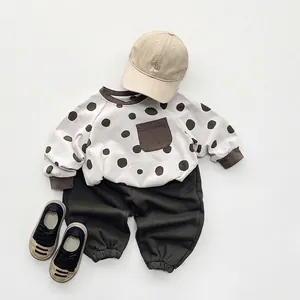 Kids minimalist white polka dot sweatshirt and brown jogger pants two-piece outfit
