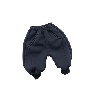 Thick fleece lined kids sweatpants in navy blue with elastic waist and ribbed cuffs