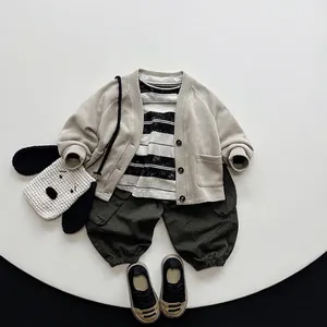 Harajuku style kids retro knit cardigan outfit with striped shirt and green cargo pants