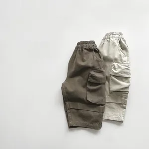 Detailed view of kids cargo shorts with elastic waist and large side pockets