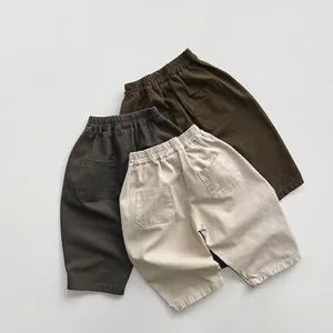 Tre paia di pantaloni casual per bambini in cotone minimalista nei colori verde grigio e crema