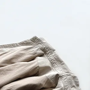 Detail of premium cotton linen stitching and double-layer inner lining of kid's shirt