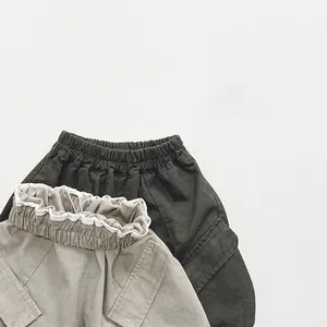 Kids relaxed cargo pants in olive and khaki colors with elastic waist and large side pockets