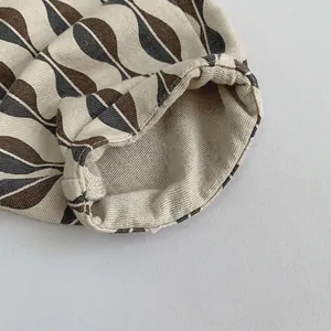 Pantalon décontracté en coton pour enfants avec motif géométrique de feuilles marron