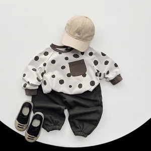 Kids long sleeve polka dot sweatshirt and brown pants set with beige baseball cap