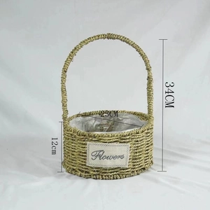 Detailed close-up of woven straw basket with Flowers label and waterproof lining
