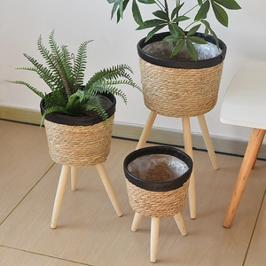Set of 3 Nordic woven rattan plant stands with wooden legs for indoor home decoration