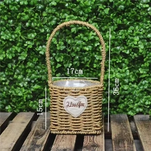 Detail of woven wicker flower basket with heart tag and waterproof plastic lining