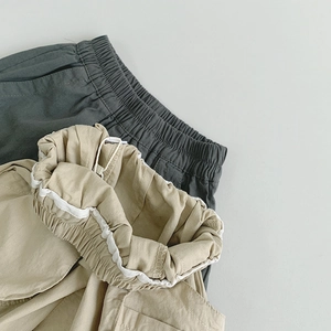 Kinder weite Baumwollhose in Dunkelgrau und Beige mit elastischem Gummibund-Detail