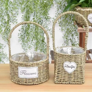 Handwoven straw flower baskets with waterproof lining and decorative heart labels