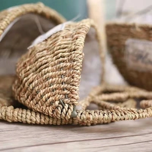 Detailed macro view of natural fiber weave texture on handmade woven storage basket