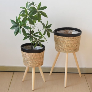 Nordic rattan plant stand set with woven grass pots and natural solid wood tripod legs