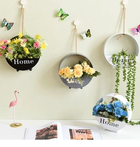 Modern iron wall planter with Home typography and rustic hemp rope for indoor hanging
