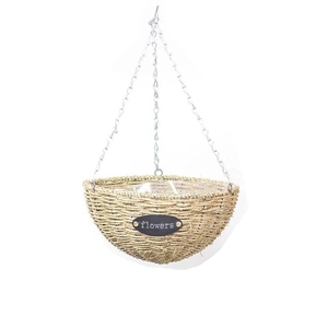 Hanging woven plant basket with flowers plate and metal chains on white background