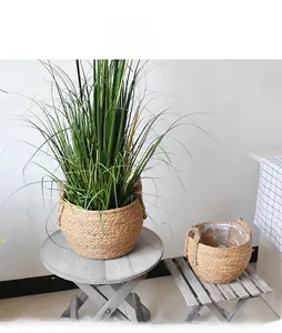 Detail view of woven flower baskets with waterproof lining and convenient double handles