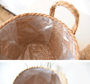 Detail view of woven bamboo flower basket with waterproof plastic lining and sturdy handle
