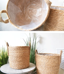 Detail of woven straw plant baskets featuring waterproof plastic liners and sturdy handles