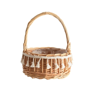 Handwoven wicker princess flower basket with white tassels and waterproof lining