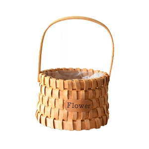 Handwoven cylindrical wood chip basket with handle and Flower label for gift floral arrangement