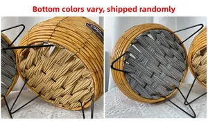Close-up of woven plastic planters with metal tripod legs and Flora fabric labels