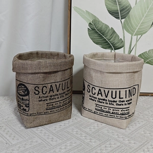 Detail of washable kraft paper storage bags in brown and beige with Nordic typography